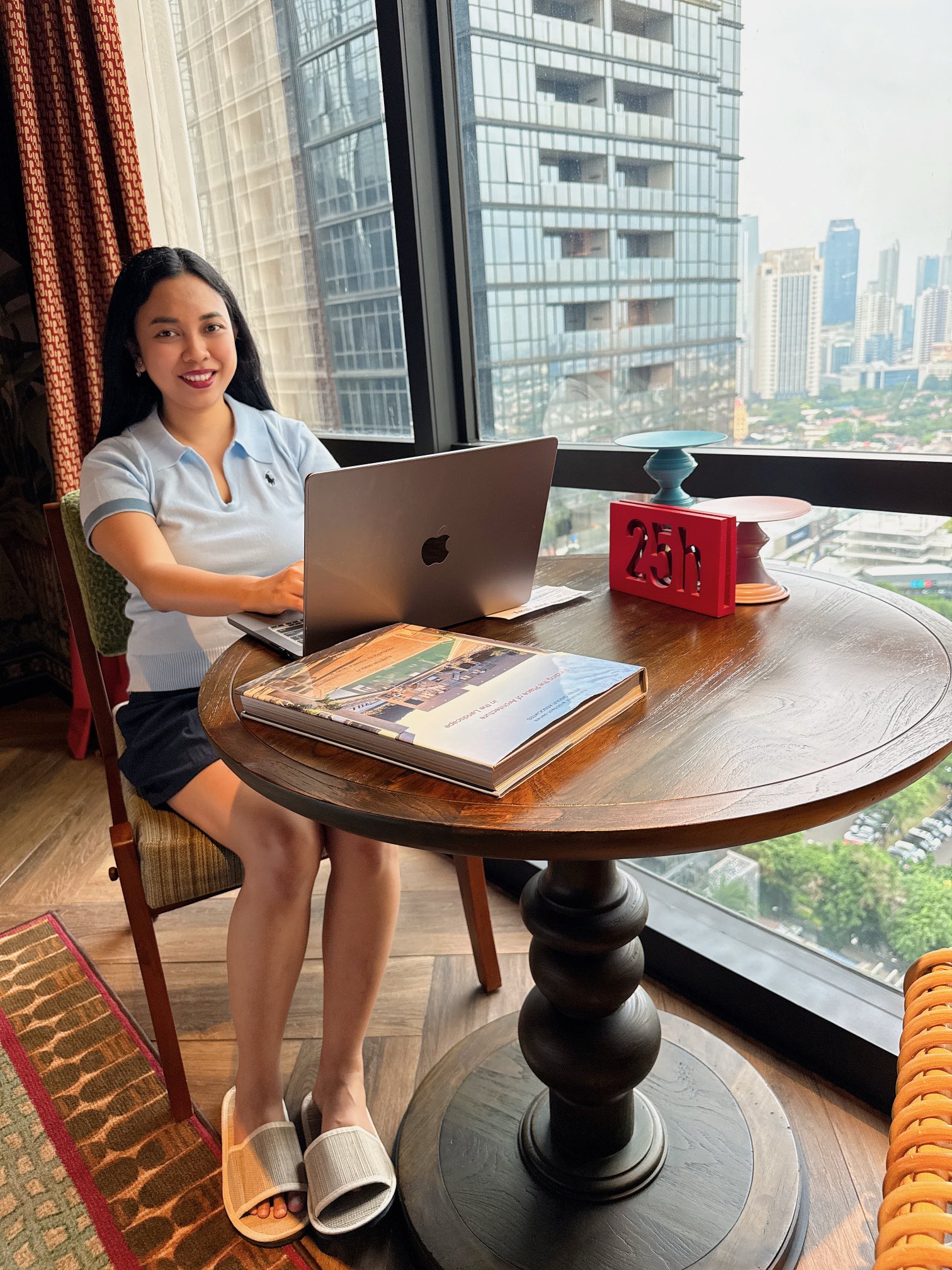 Mentari Rahman working remotely on digital growth strategies